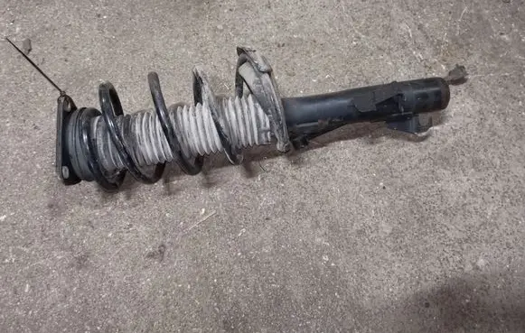 Mazda 3 II Front shock absorber with coil spring BBM334900C