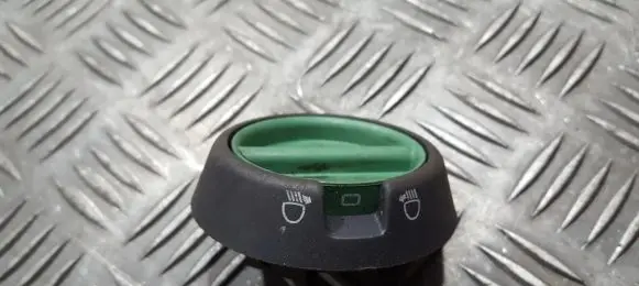 Headlight level height control switch