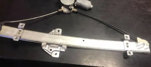 Suzuki Liana Front door window regulator with motor 83430-76f10