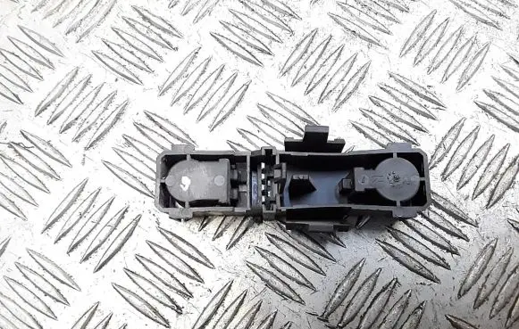 Tail light bulb cover holder