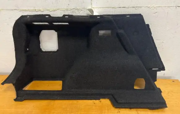 Trunk/boot lower side trim panel