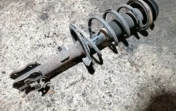 Opel Agila B Front shock absorber with coil spring 4160251KA1