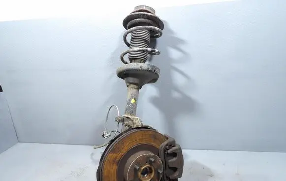 Subaru Legacy Front shock absorber with coil spring