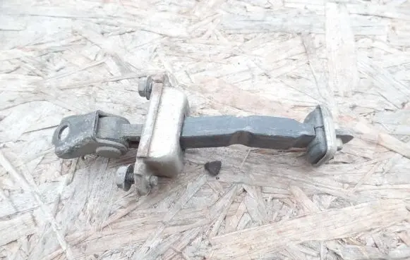 Infiniti G20 Front door check strap stopper