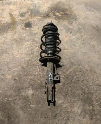 KIA Sportage Front shock absorber with coil spring 