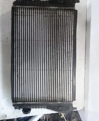 Volkswagen Touran I Intercooler radiator 1K0145803L