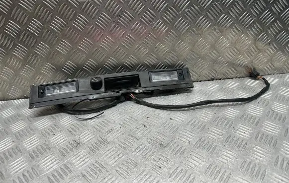 Hyundai Tucson TL Trunk door license plate light bar 87372D7010