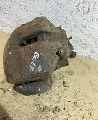 Volkswagen Golf VI Front brake caliper