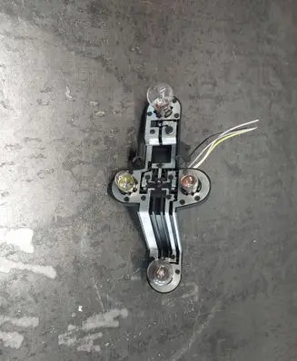 Volvo S60 Tail light bulb cover holder 153851