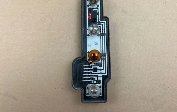 Volkswagen Caddy Tail light bulb cover holder 2K0945258A