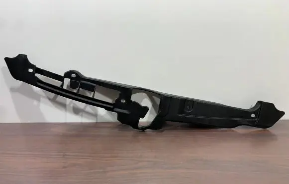 Engine bonnet/hood lock trim molding