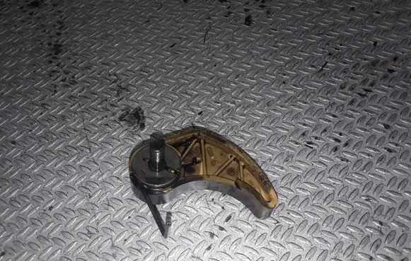 Volkswagen PASSAT B5.5 Slide rail for timing chain 06A115130B