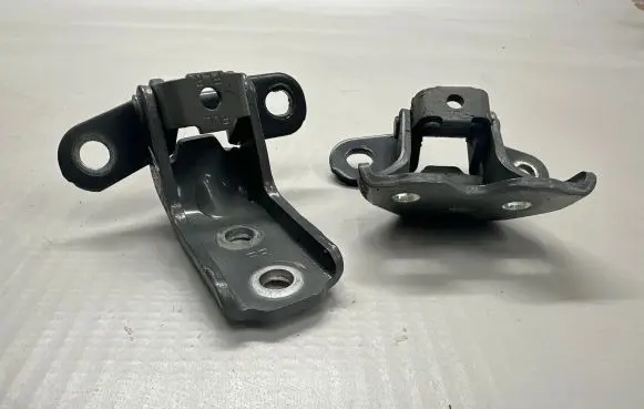 Hyundai Tucson IV NX4 Front door upper hinge A046057