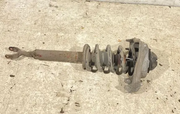 Front shock absorber with coil spring