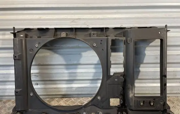 Radiator support slam panel bracket