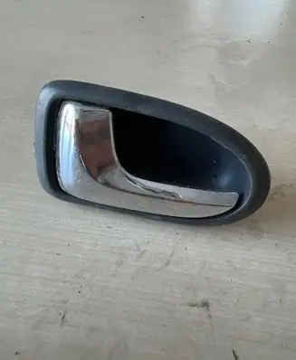 Mazda 323 Rear door interior handle