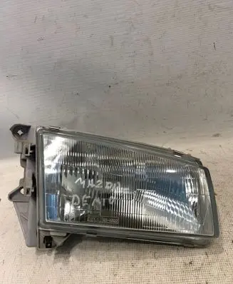 Mazda Demio Headlight/headlamp 52055737R