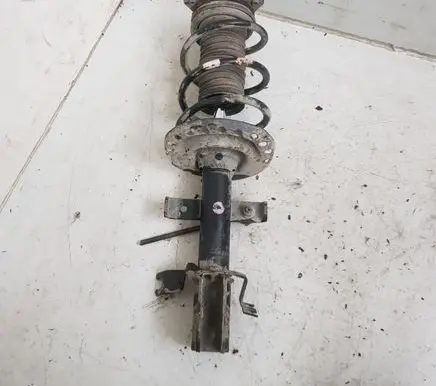 Renault Clio III Front shock absorber with coil spring