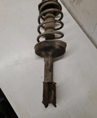 Renault Kangoo I Front shock absorber with coil spring