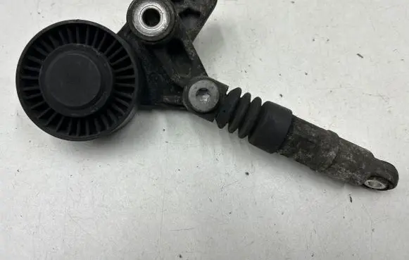 Generator/alternator belt tensioner