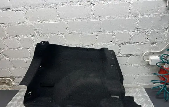 Trunk/boot lower side trim panel