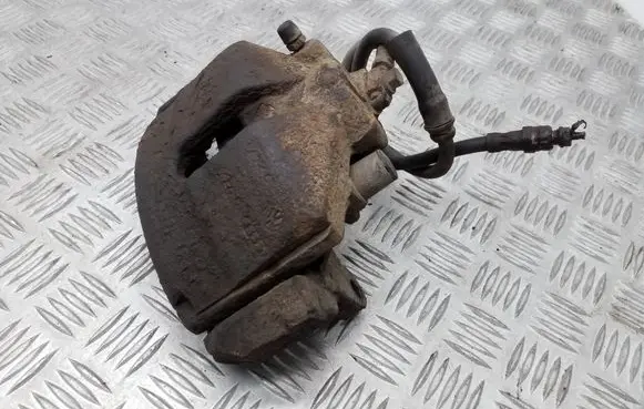 Volkswagen PASSAT B6 Front brake caliper 582