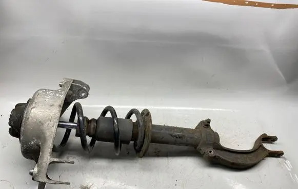 Front shock absorber with coil spring