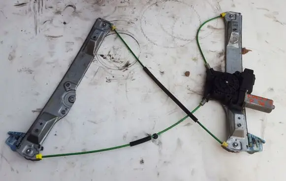 Opel Corsa D Front door window regulator with motor 