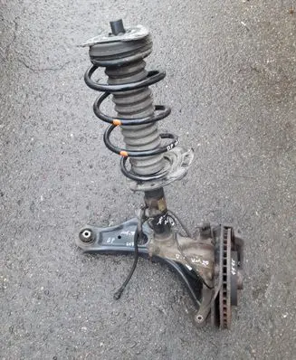 Front wheel hub spindle knuckle