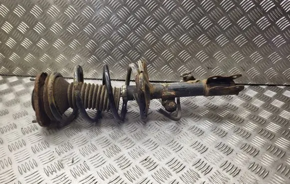 Front shock absorber with coil spring