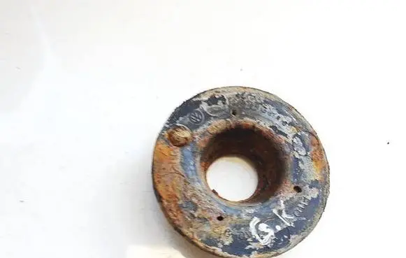 Volkswagen Touran I Front coil spring rubber mount 1K0512297C