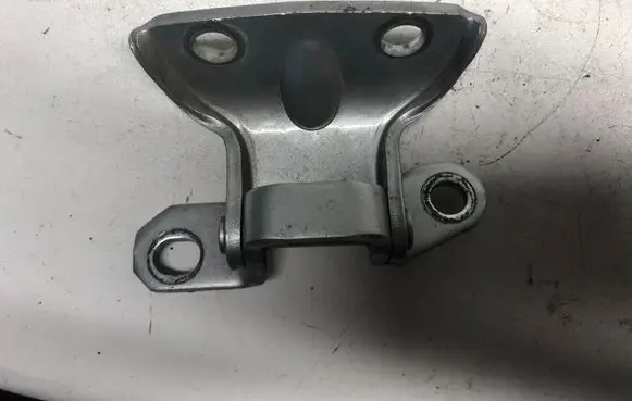 Rear door upper hinge