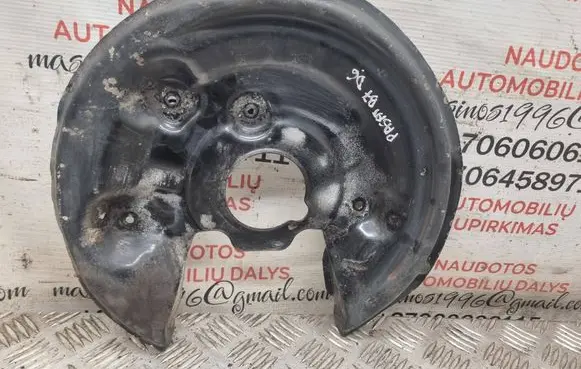Volkswagen PASSAT B7 Rear brake disc plate dust cover 5N0615612C
