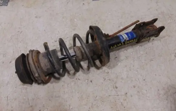 Opel Astra G Front shock absorber with coil spring 72119046 42140325SX 9194840