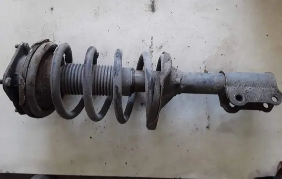 KIA Carnival Front shock absorber with coil spring