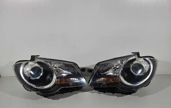 Volkswagen Touran I Headlights/headlamps set 103419012921