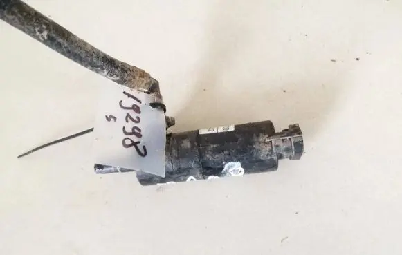 Opel Zafira A Headlight washer pump 90508709