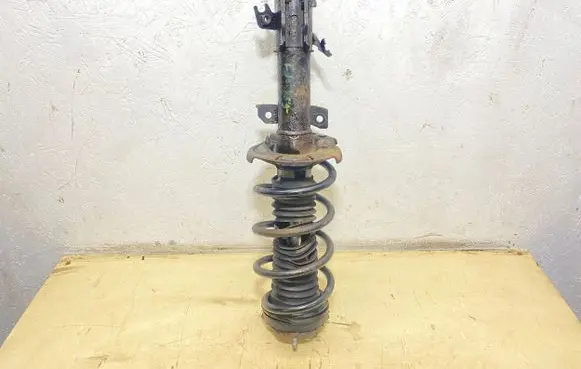 Ford Transit Courier Front shock absorber with coil spring 61471140