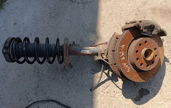 Front shock absorber with coil spring