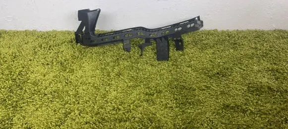 Subaru Forester SK Headlight/headlamp mounting bracket 57707SJ010