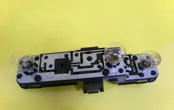 Nissan Almera N16 Tail light bulb cover holder 236873