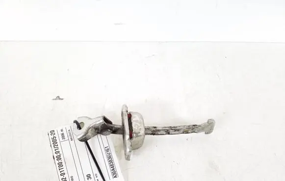 Rear door check strap stopper