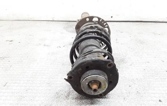 Volkswagen Polo Front shock absorber with coil spring