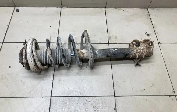 Nissan X-Trail T30 Rear shock absorber with coil spring 