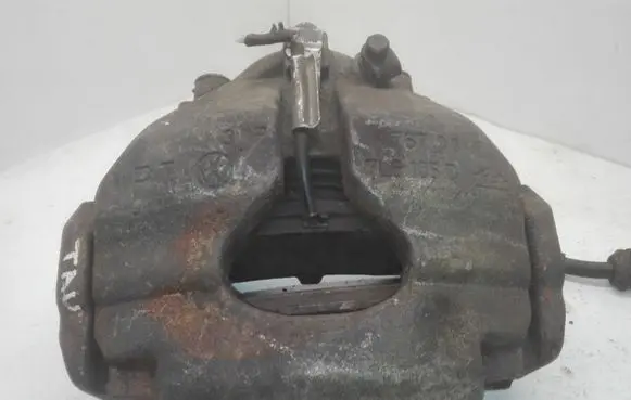 Volkswagen Touareg I Front brake caliper 7L6105D