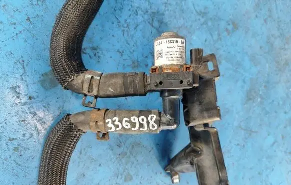 Ford Expedition Coolant heater control valve JL3Z18495J