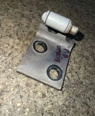 Front door lower hinge