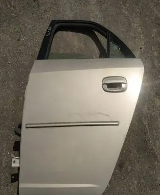 Cadillac CTS Rear door smelio