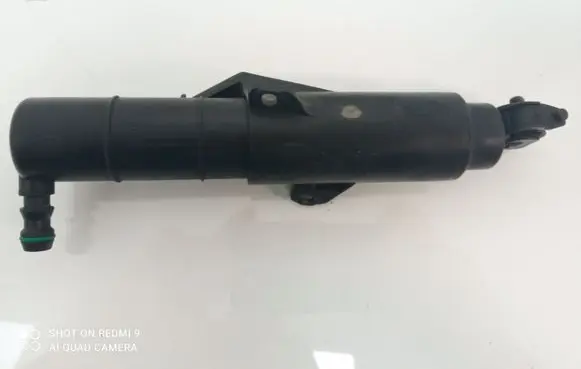 Headlight washer spray nozzle