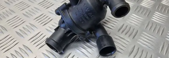 Thermostat/thermostat housing